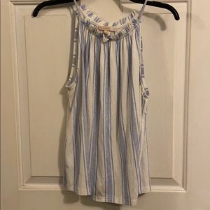 Blue and white striped sleeveless top